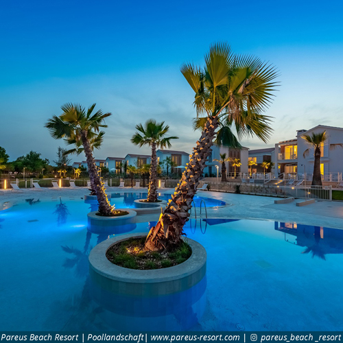 Pareus Beach Resort Pool Clubhouse At Night 2